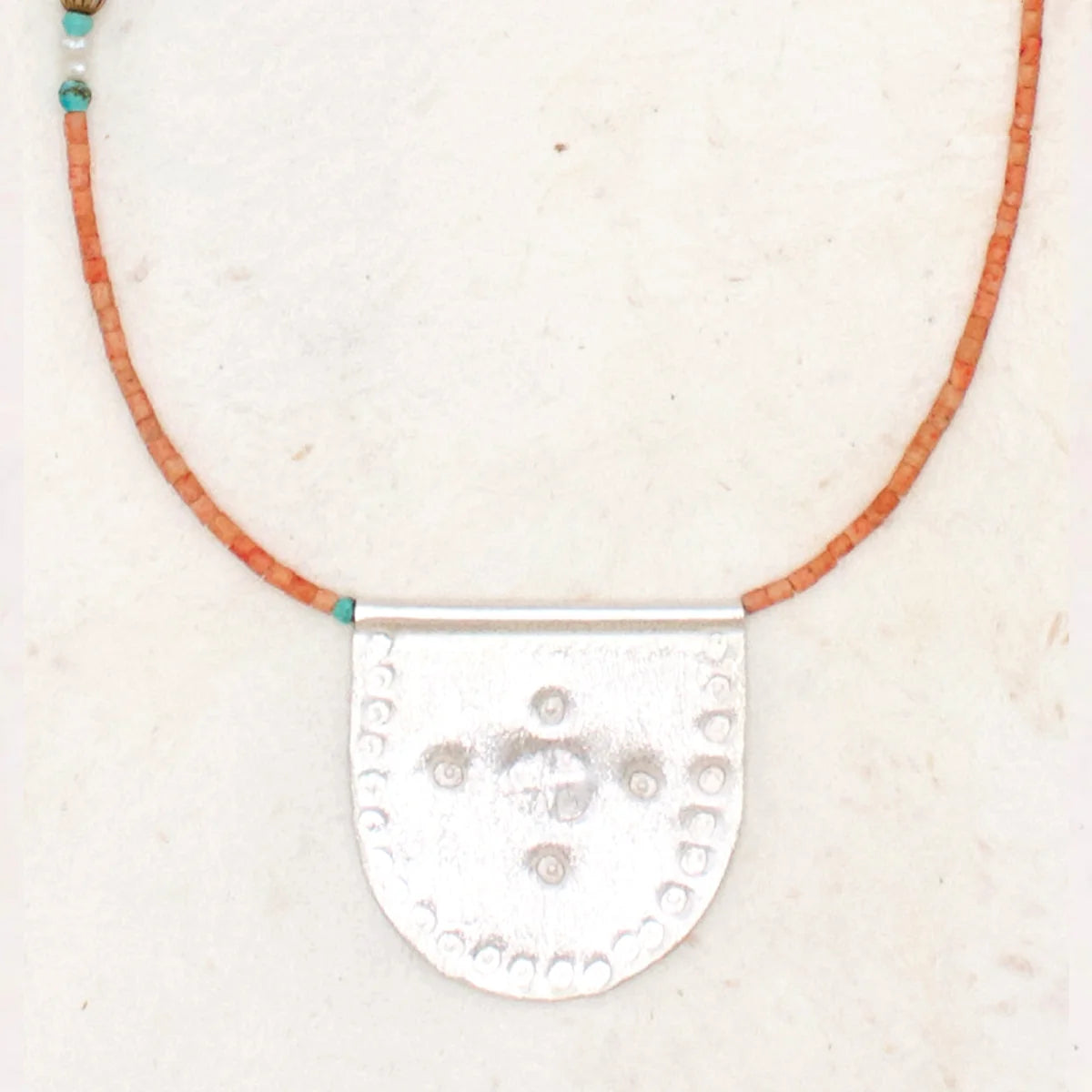 Silver Sea Talisman on Pink Coral Necklace