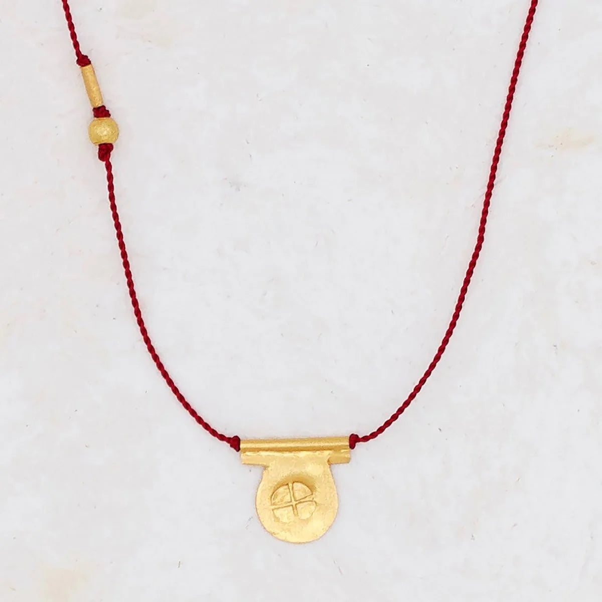 Circle Talisman Necklace on Red Nylon