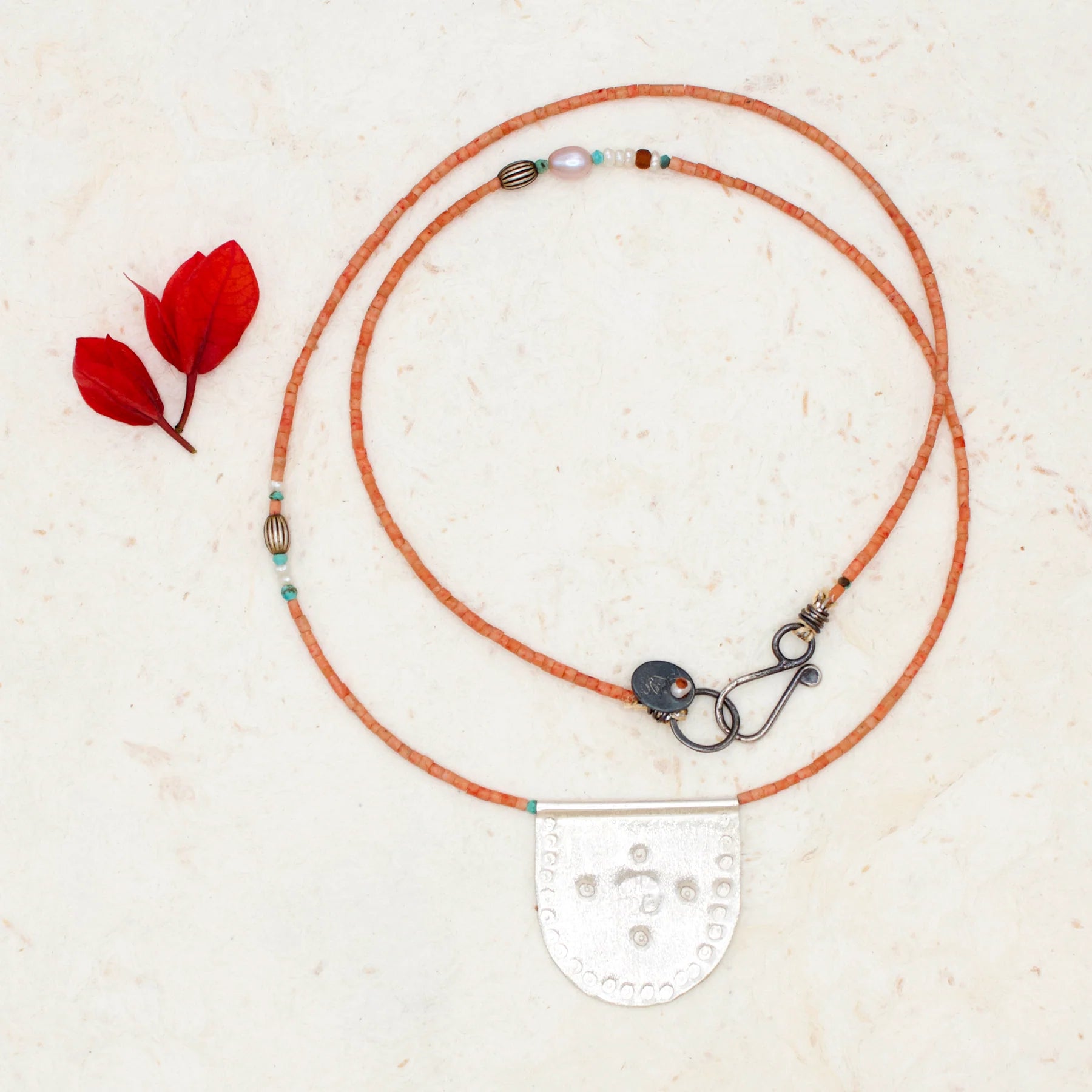 Silver Sea Talisman on Pink Coral Necklace