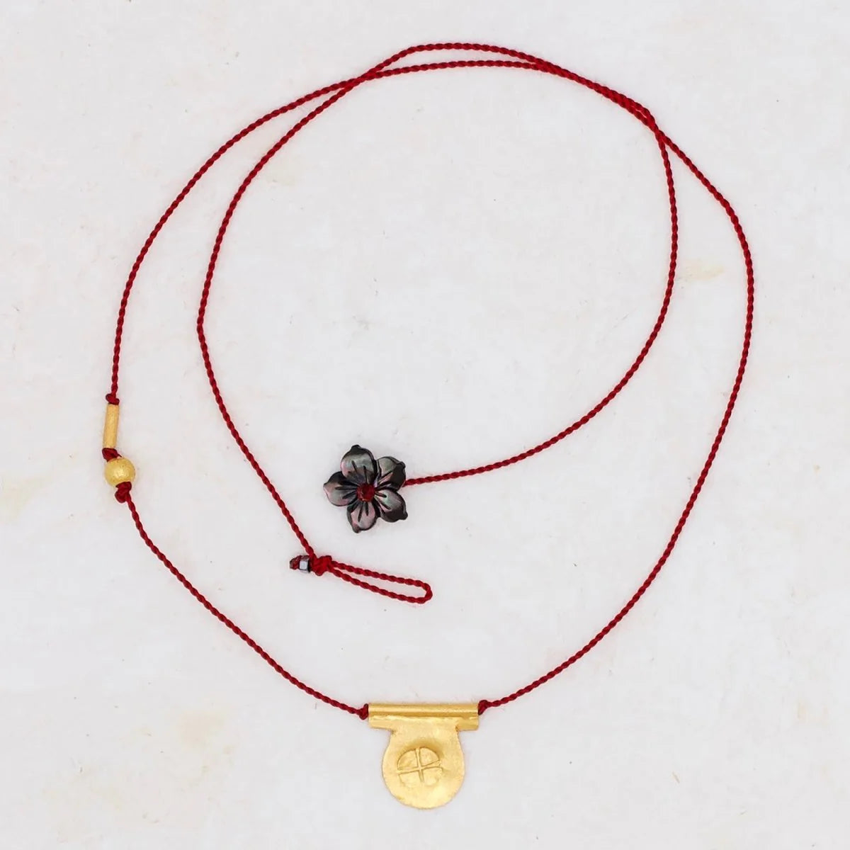 Circle Talisman Necklace on Red Nylon