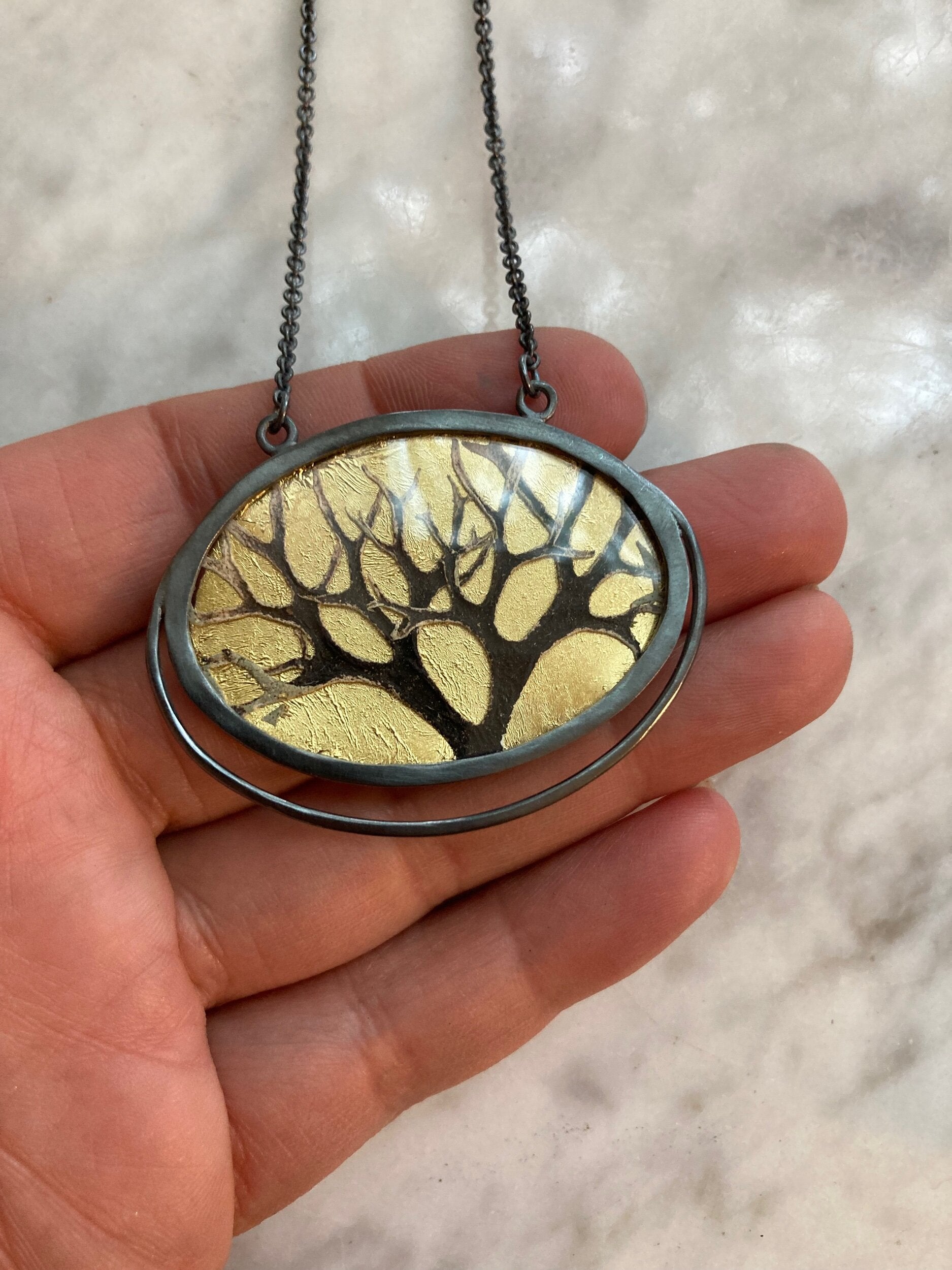 Golden Earth Pendant Necklace