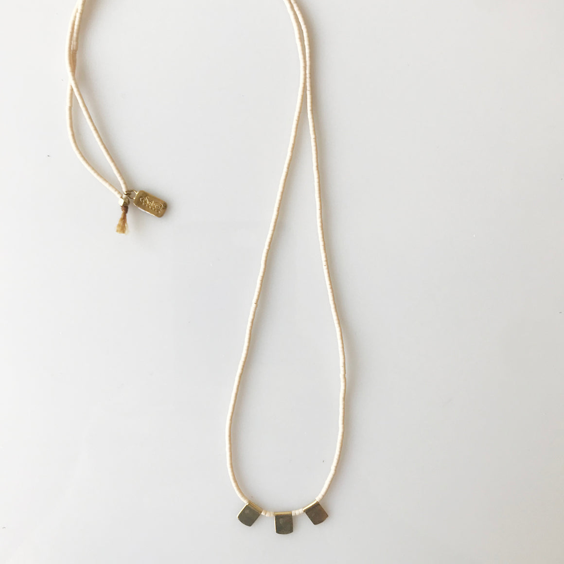 Cream Beaded Necklace w/ Brass Flag - KESTREL